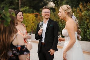 A sequence of candid moments at an outdoor wedding celebration in a garden setting.