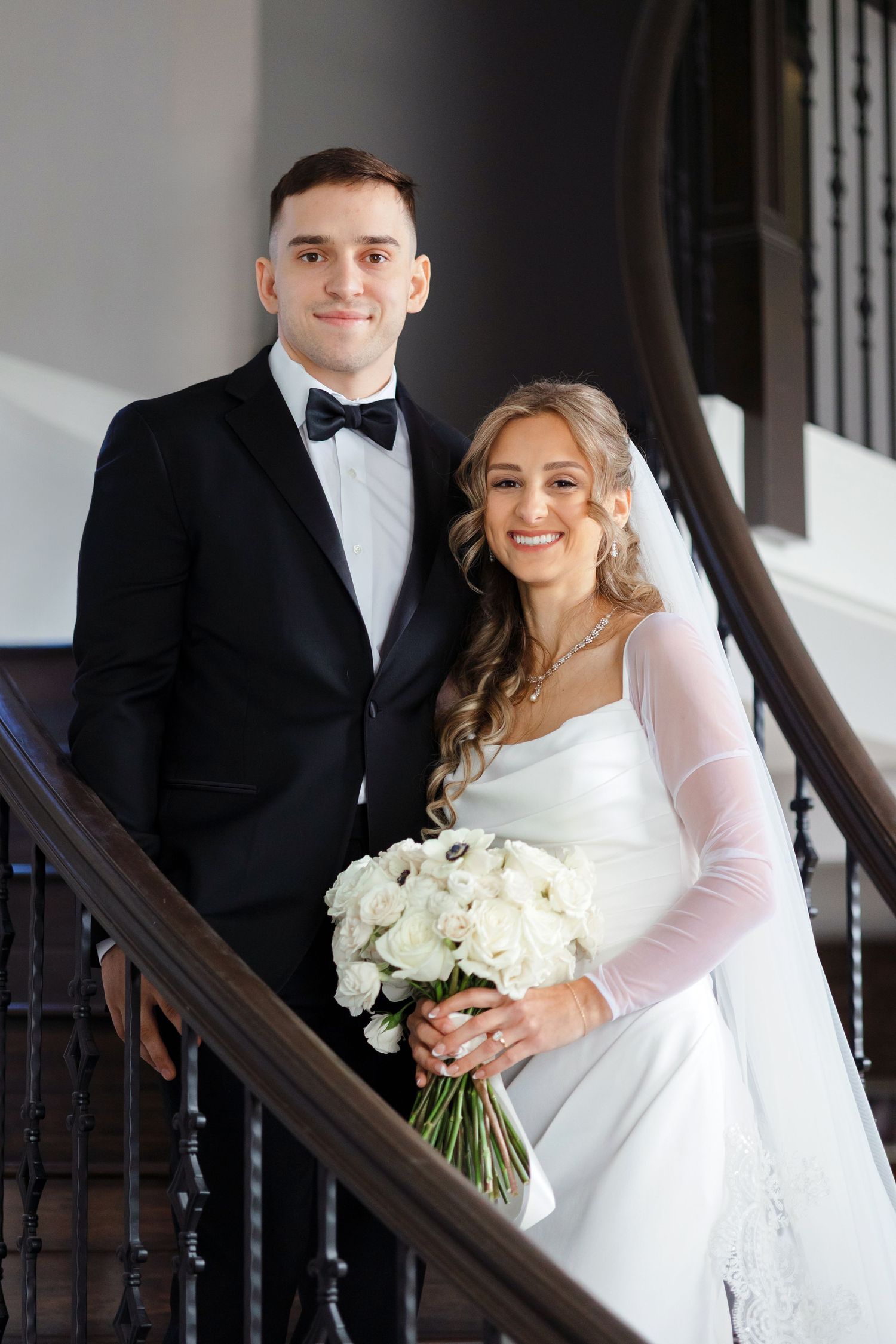 Bride and groom portrait on staircase photographed by Tom Forrest from Hudson, Ohio.