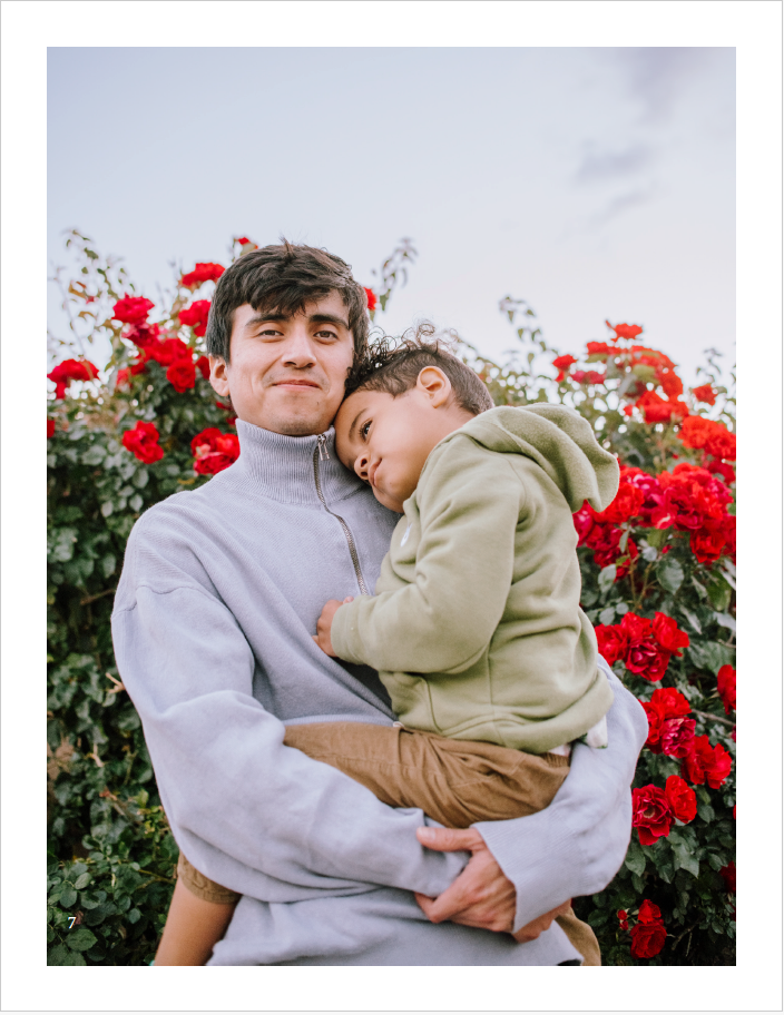 A father carrying his child