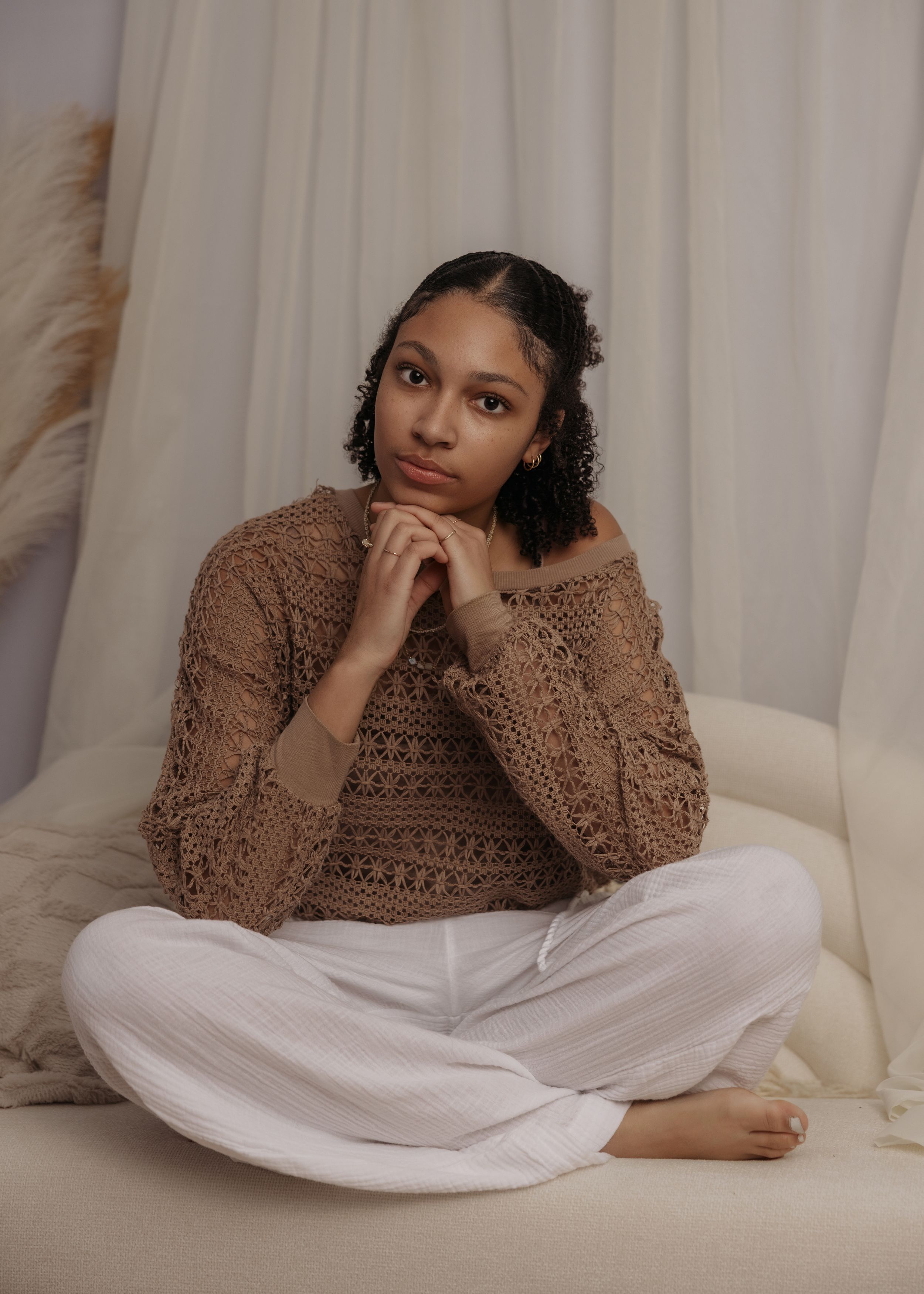 A collection of relaxed portraits showing someone in a brown knit sweater against a light background.
