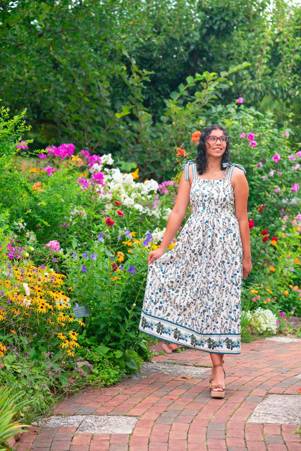 Senior photos at the Green Bay Botanical Gardens during sunset.