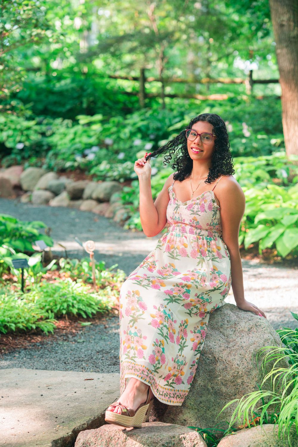 Senior photos at the Green Bay Botanical Gardens during sunset.