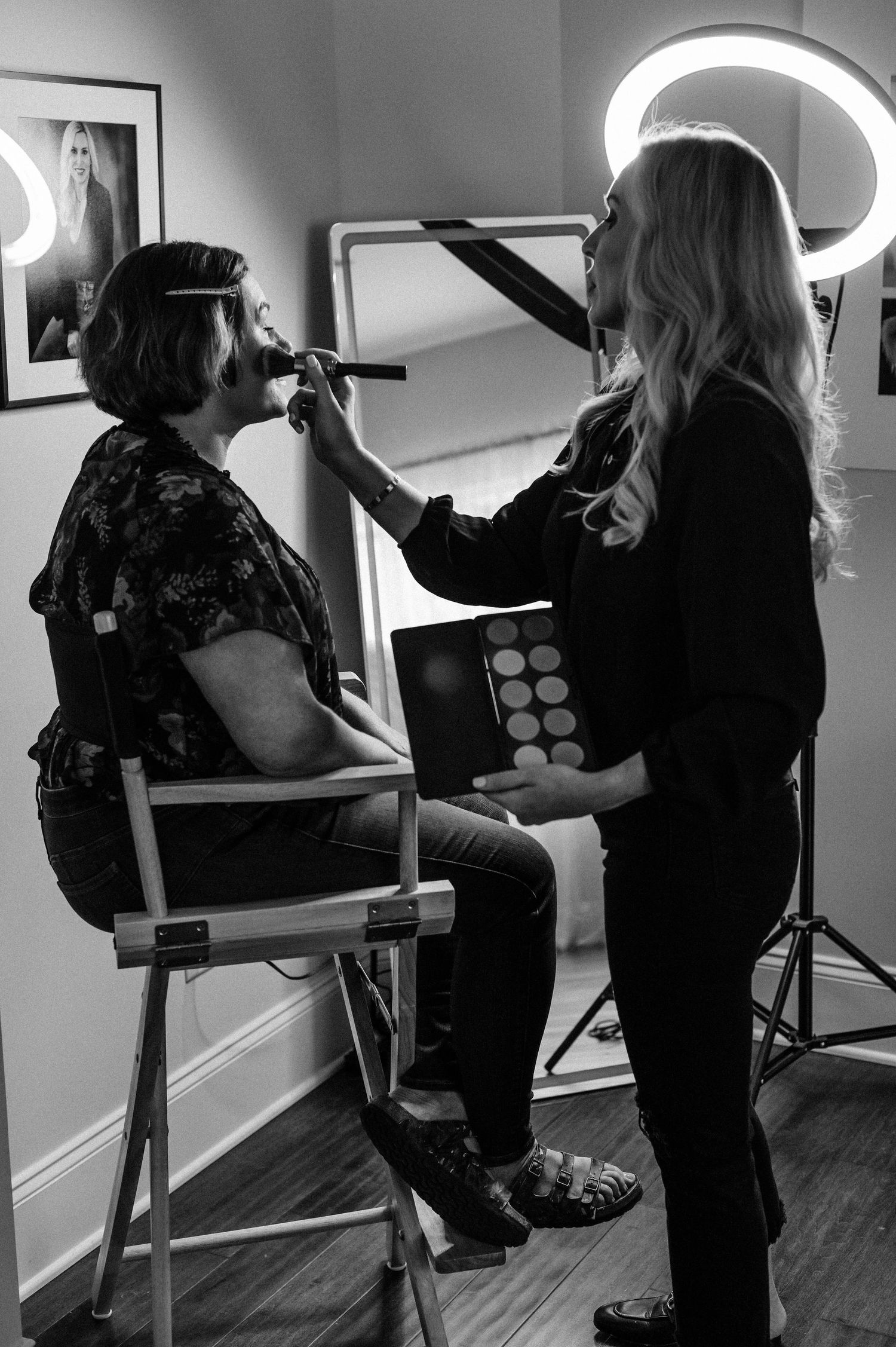 Behind the scenes photography session with lighting equipment and mirror setup.