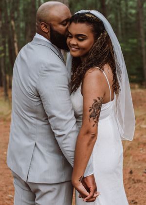 Couple posing for wedding photography captured by southern Maryland wedding photographer Mallory Bramlett.