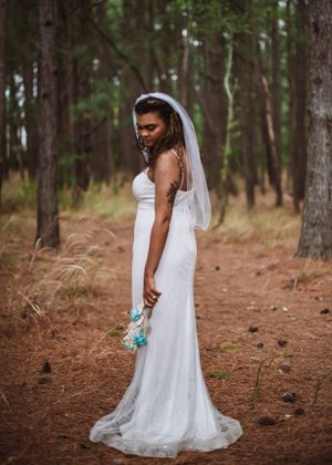 Bride posing for wedding photography captured by southern Maryland wedding photographer Mallory Bramlett.