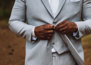 Groom posing for wedding photography captured by southern Maryland wedding photographer Mallory Bramlett.