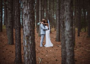 Couple posing for wedding photography captured by southern Maryland wedding photographer Mallory Bramlett.