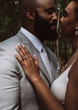 Couple posing for wedding photography captured by southern Maryland wedding photographer Mallory Bramlett.