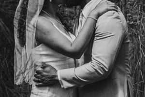 Couple posing for wedding photography captured by southern Maryland wedding photographer Mallory Bramlett.