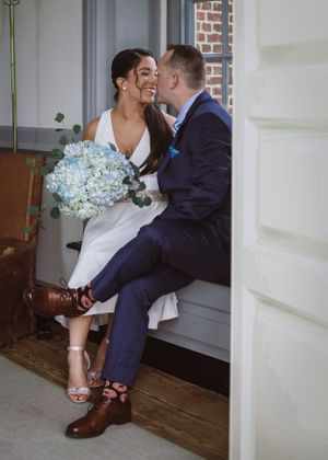 Couple posing for wedding photography captured by southern Maryland wedding photographer Mallory Bramlett.