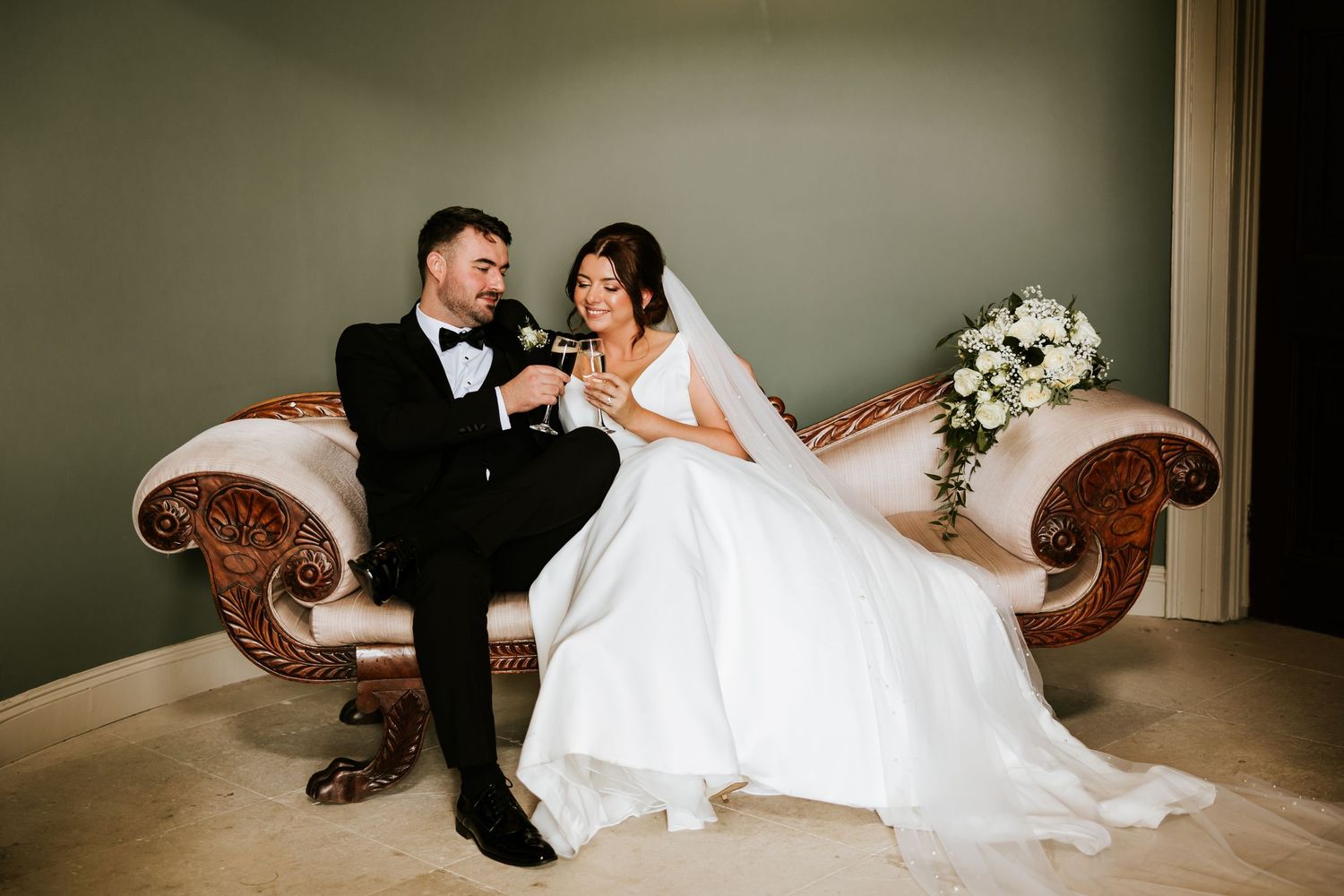 A collection of romantic couple poses on a wedding couch showing tender moments and playful interactions.
