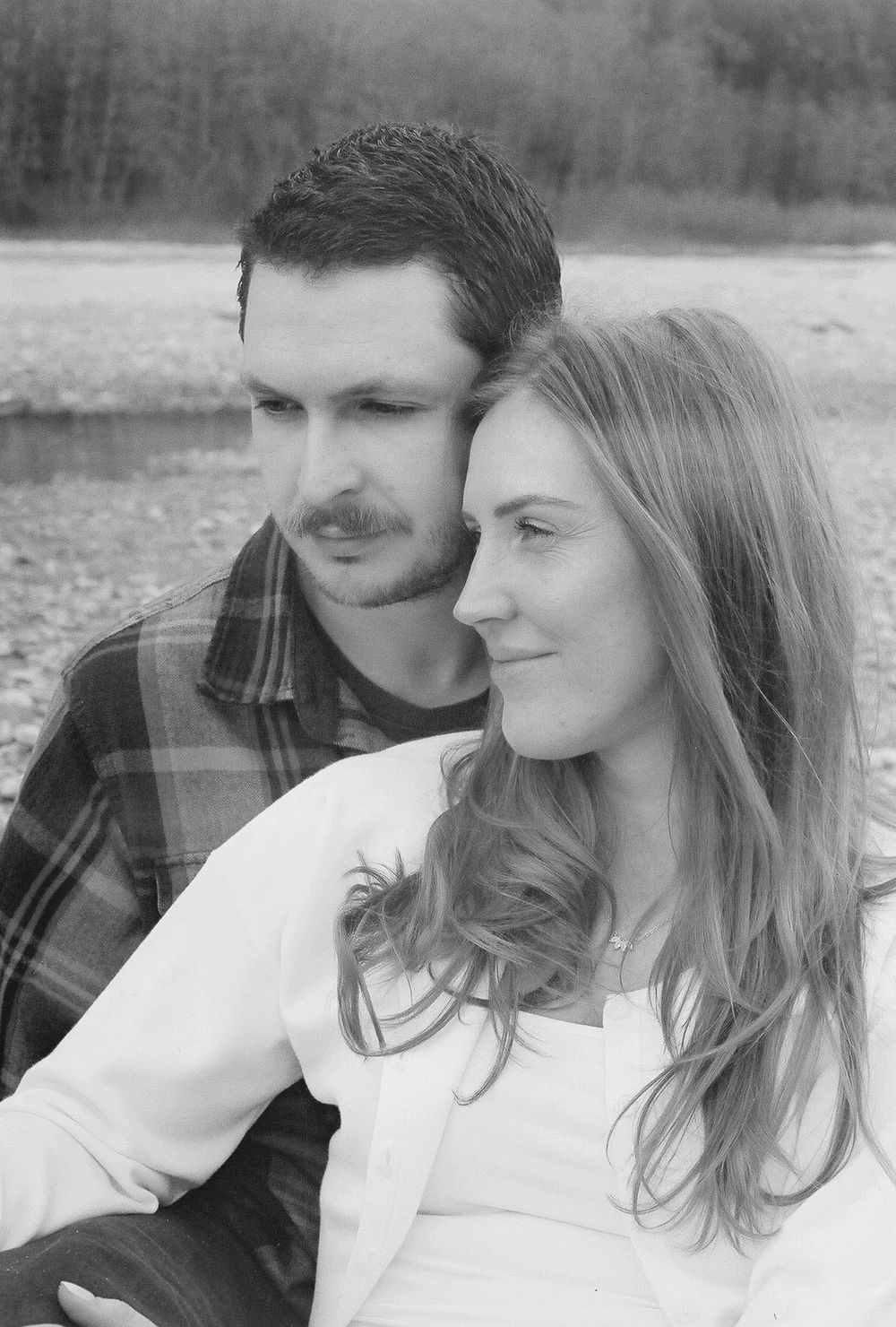 Intimate black and white portrait by natural outdoor setting.