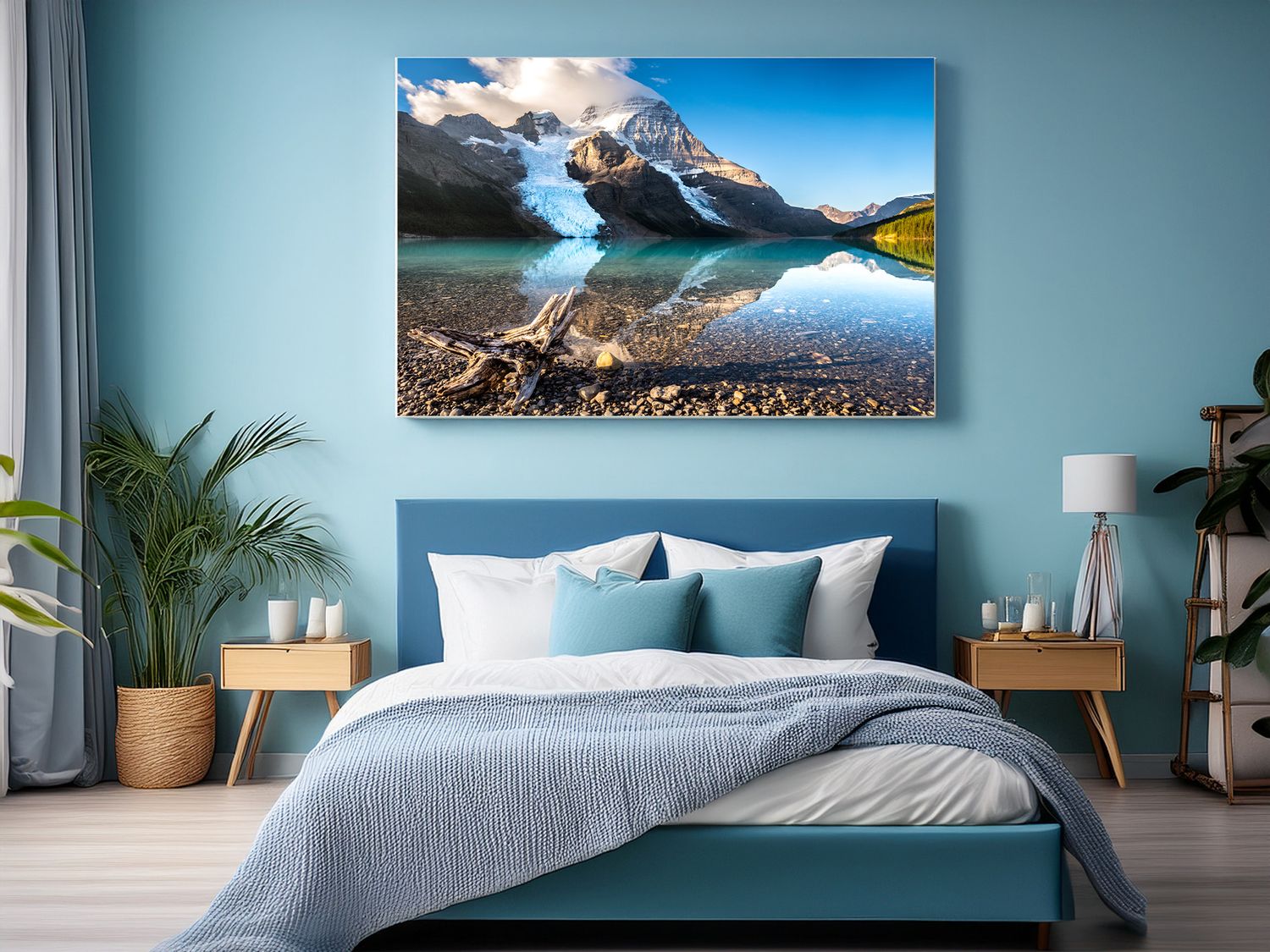 Bedroom with mountain lake canvas print above bed featuring blue and white color scheme.