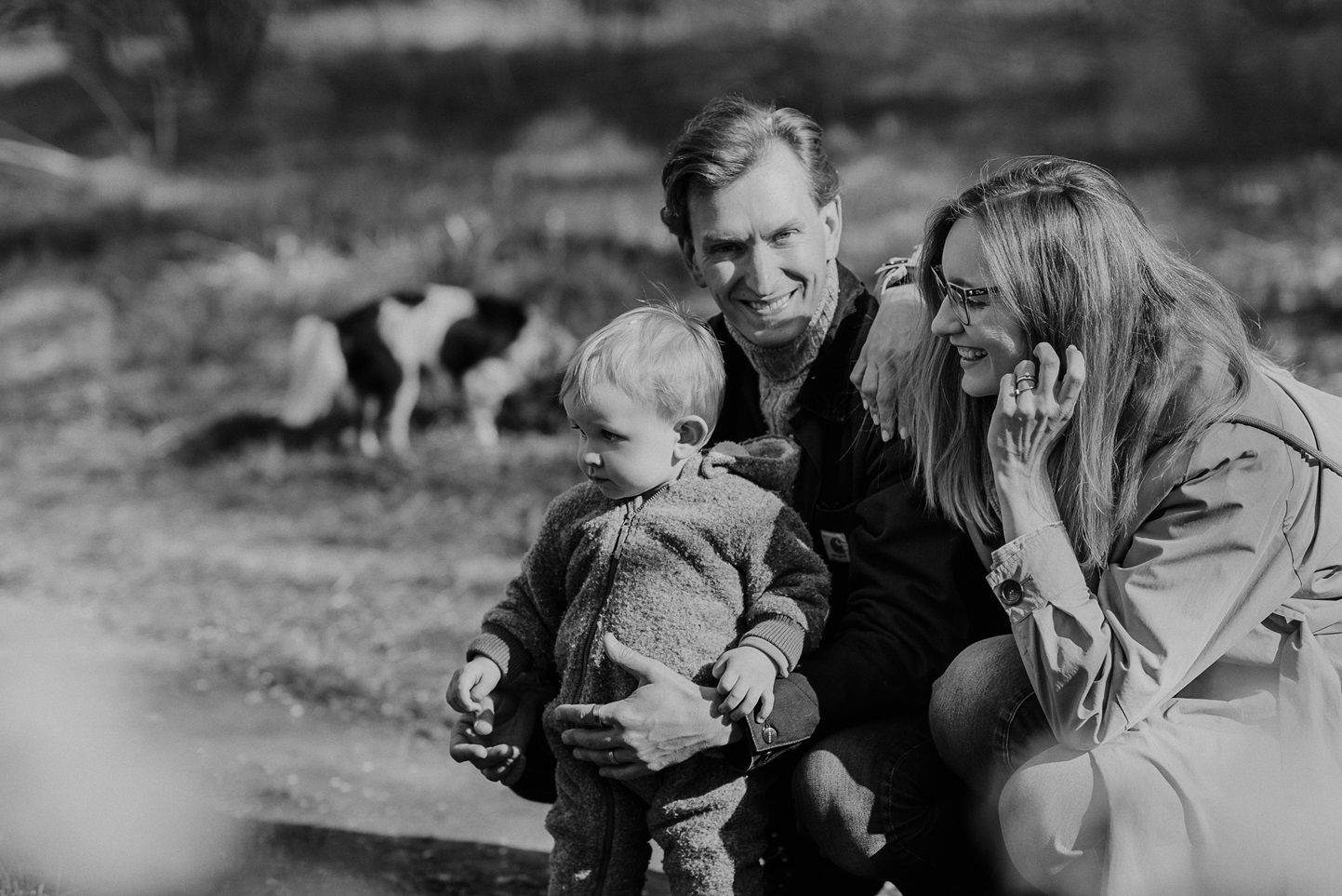 Family sharing joyful moments together during a spring photo session.