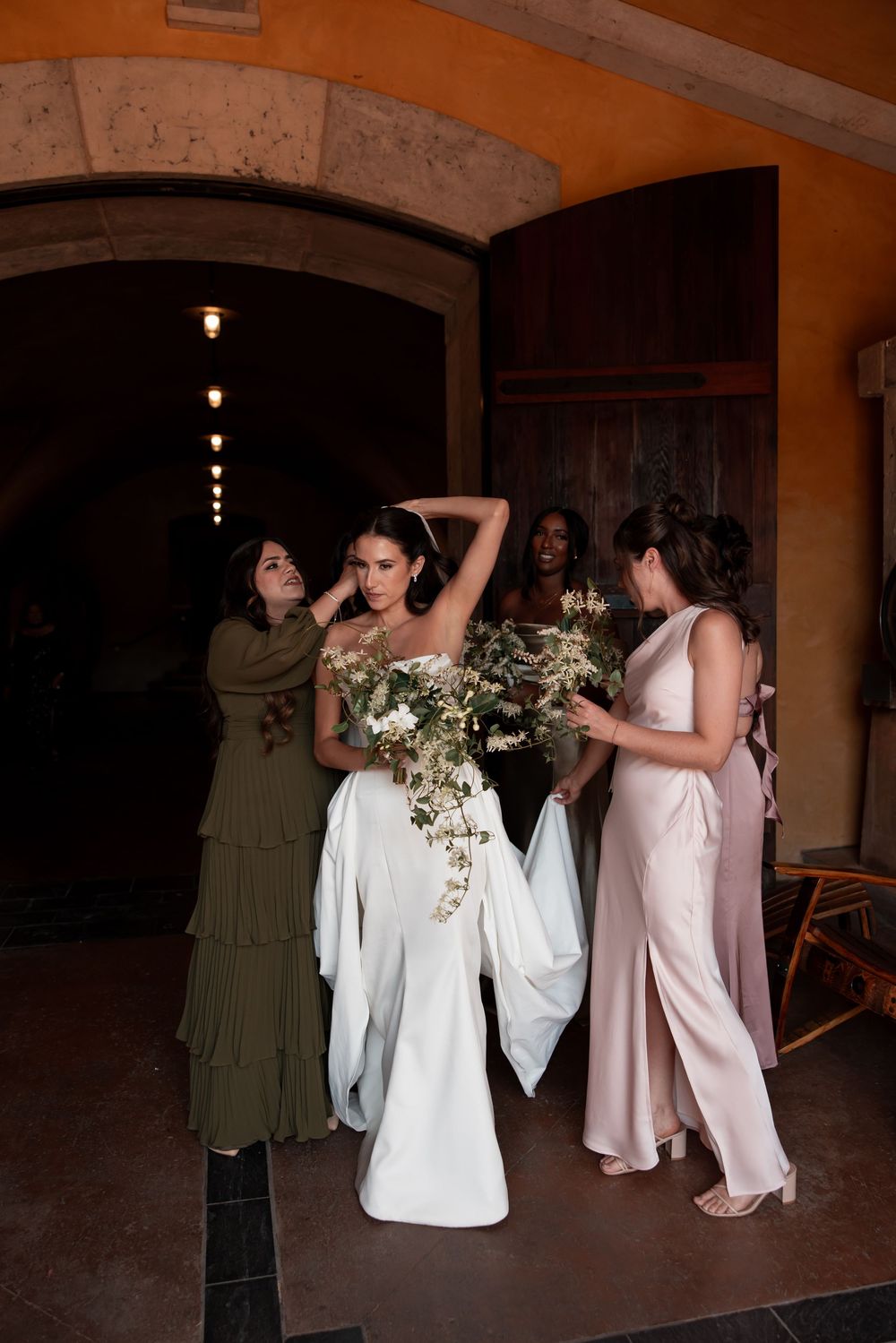 A series of wedding party photos showing people dancing and posing in an indoor venue with warm lighting.