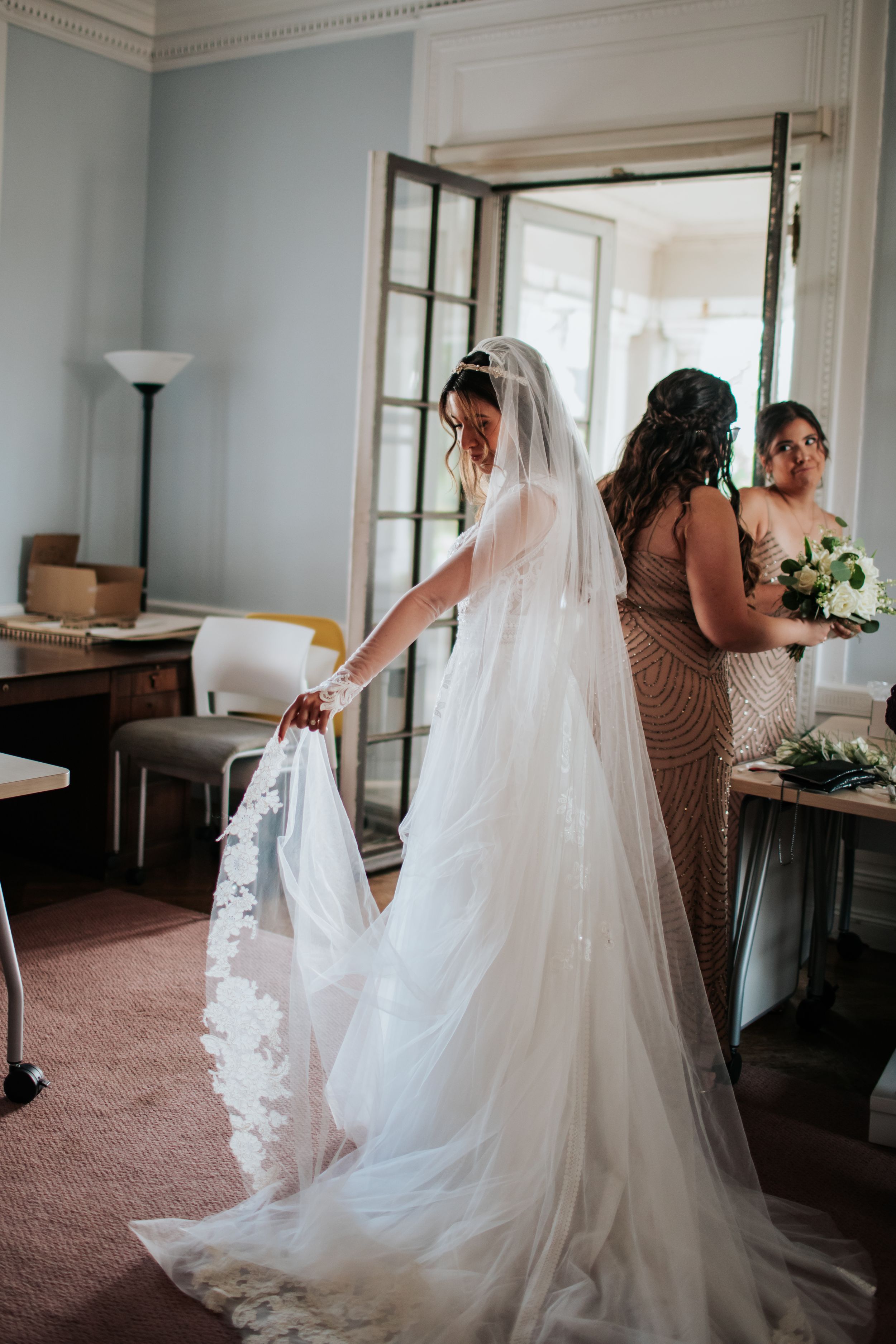 A flowing white wedding dress and veil are captured in a sequence of elegant bridal preparation moments.