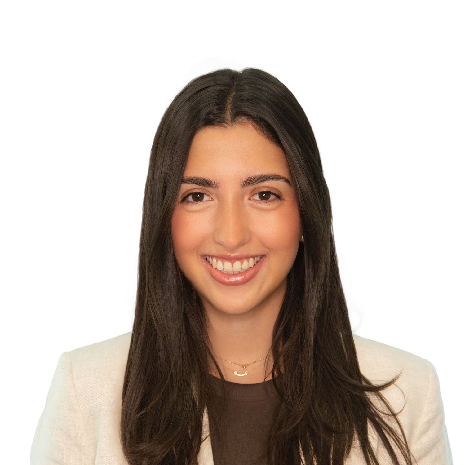 A headshot of a woman with dark hair and white clothing against a light background with Leah Ramuglia Photography in Boston.