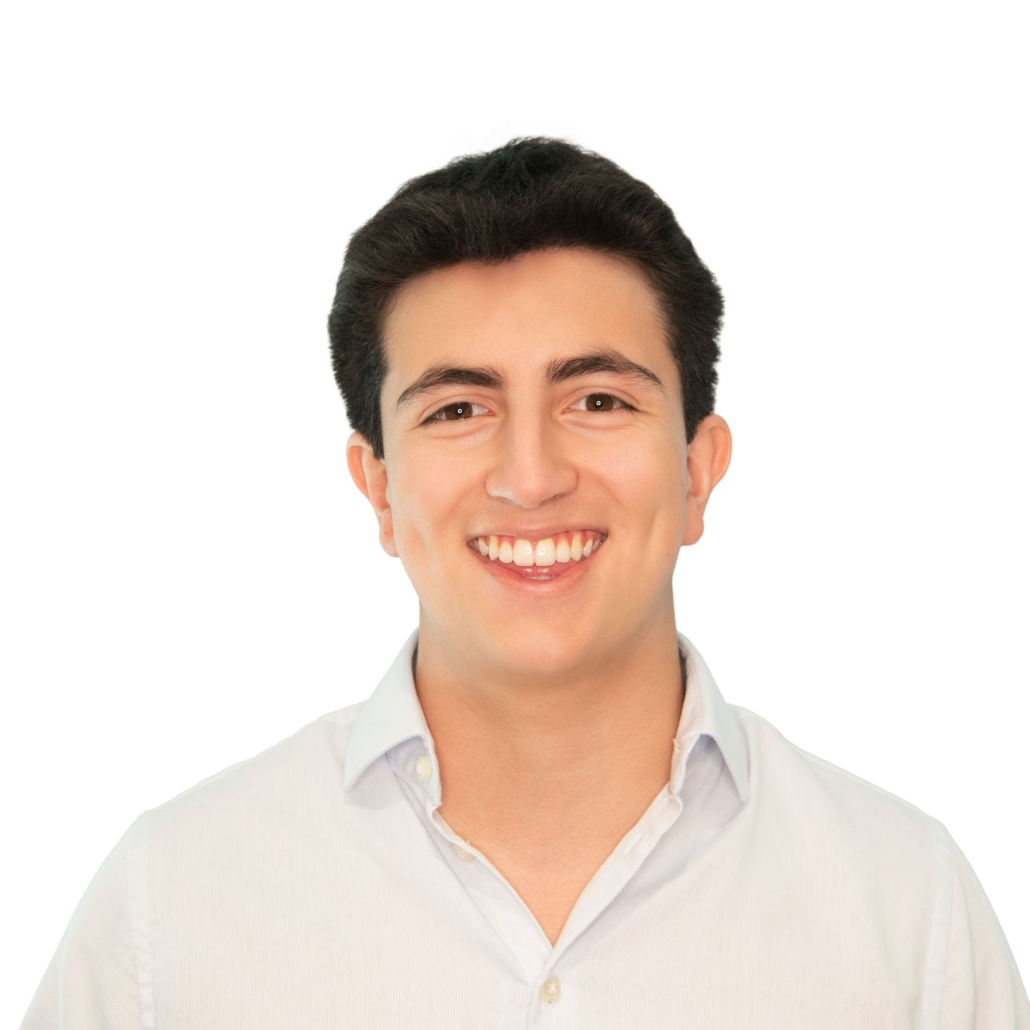 Person wearing a white button-up shirt smiling warmly against a light background.
Professional men’s headshots in Boston with Leah Ramuglia.