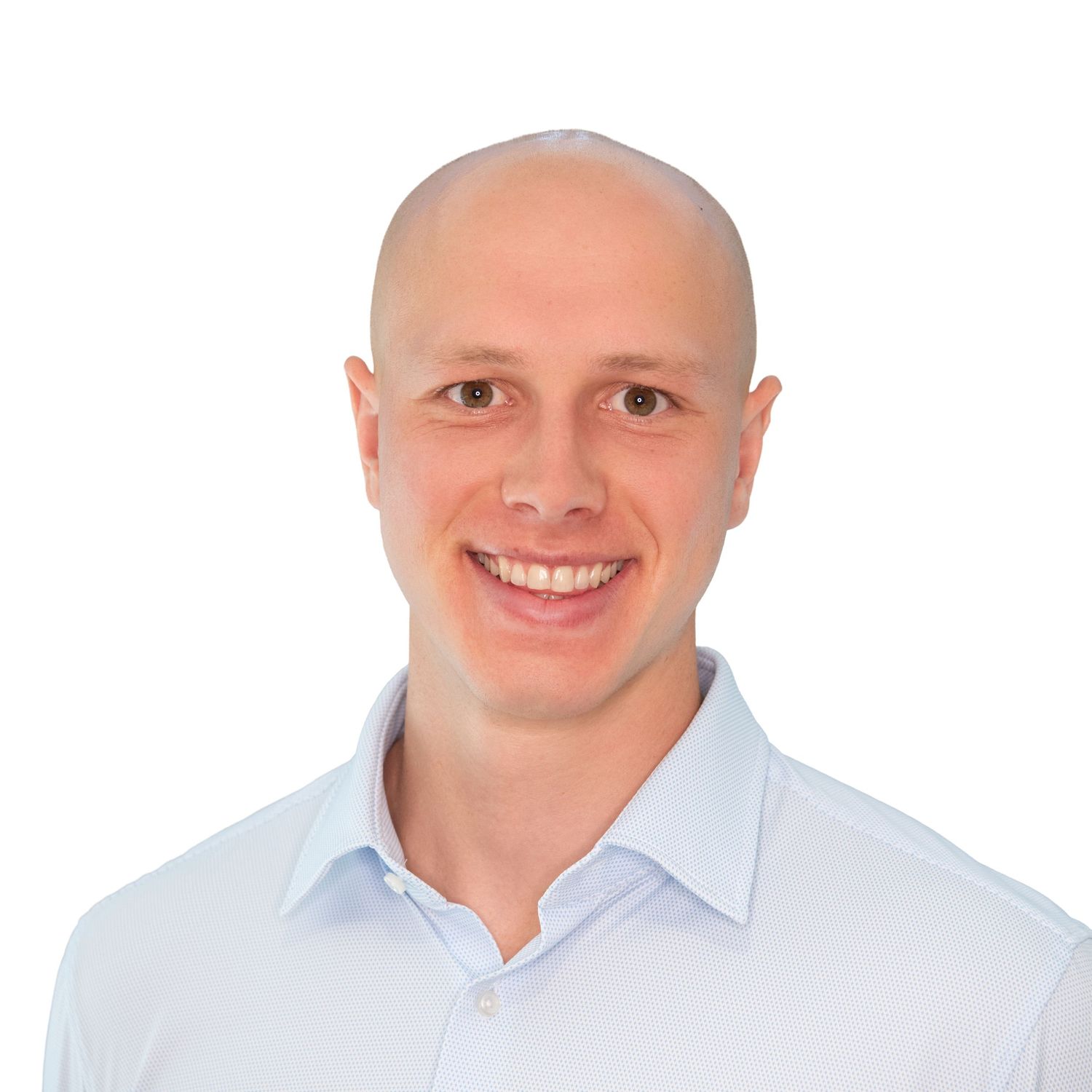 Professional headshots of a bald person in a white shirt photographed by Leah Ramuglia in Boston, MA.