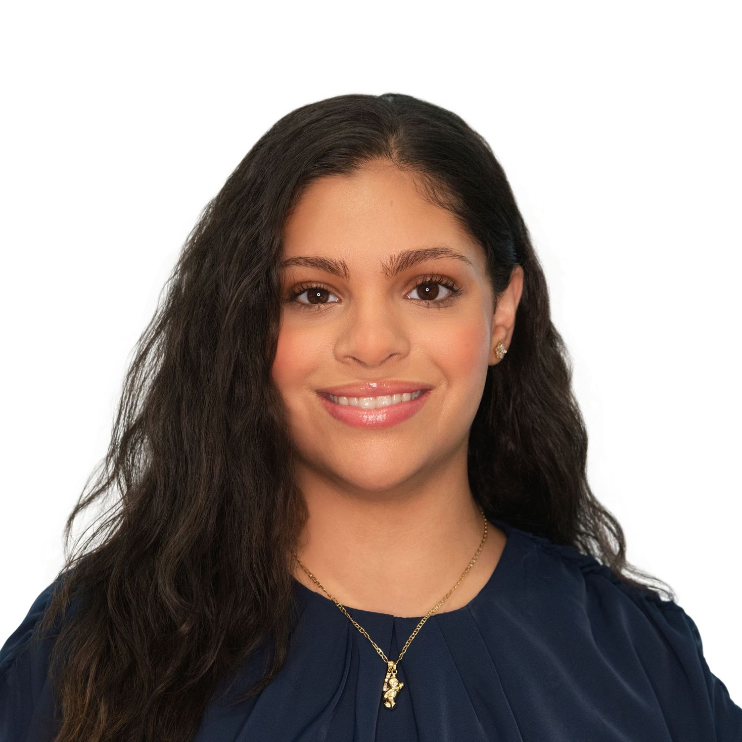 Professional headshot of a woman with long dark wavy hair wearing a navy top and delicate necklace with Leah Ramuglia Photography in Boston.