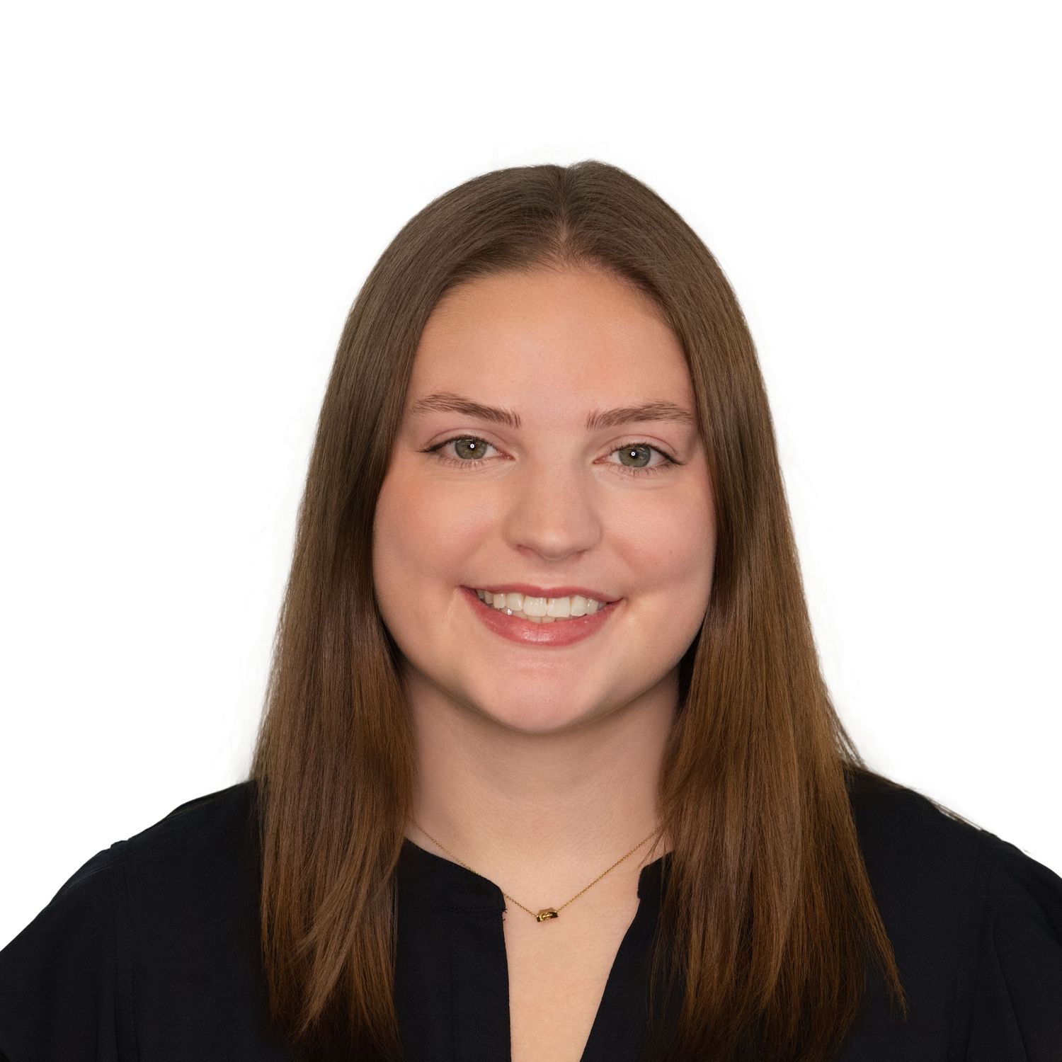 Professional headshot of a woman wearing a black blouse photographed by Leah Ramuglia in Boston, MA.