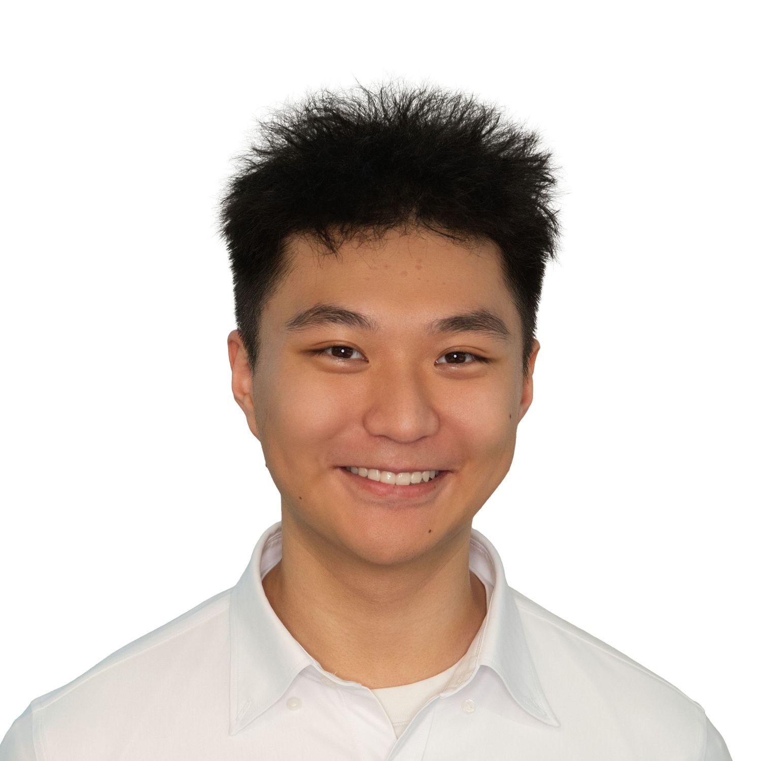 Person wearing a white shirt smiles warmly in a series of headshot photos with Leah Ramuglia Photography in Boston.