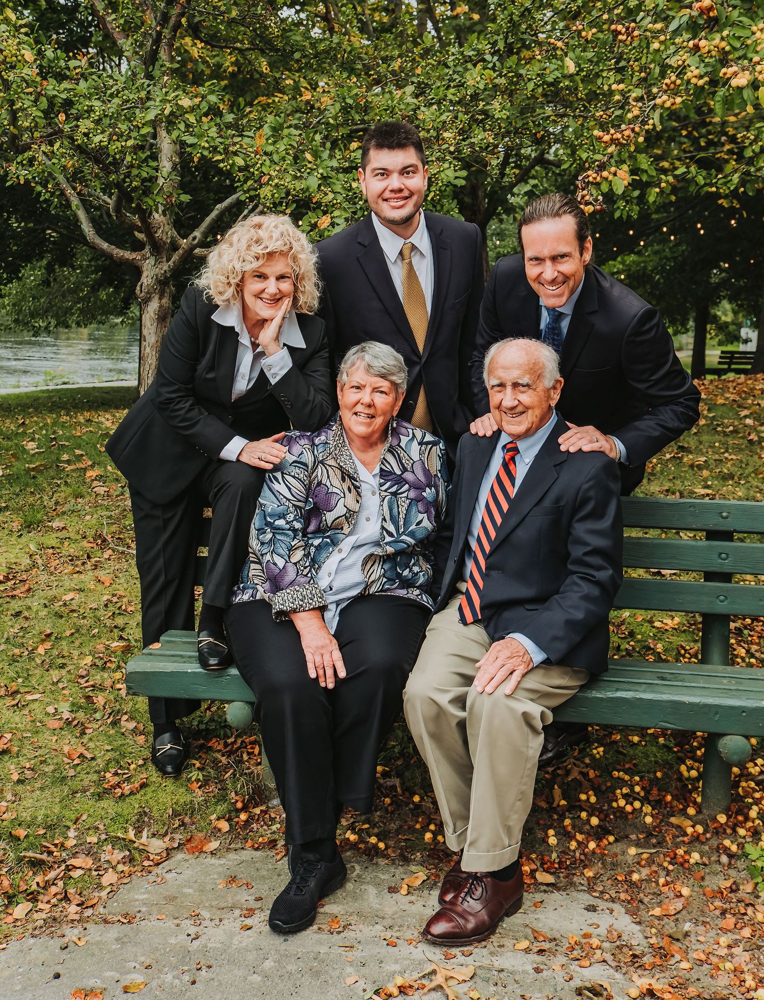 A group of financial experts from the Mendall Financial Group, pose together near their office in Augusta, Maine.