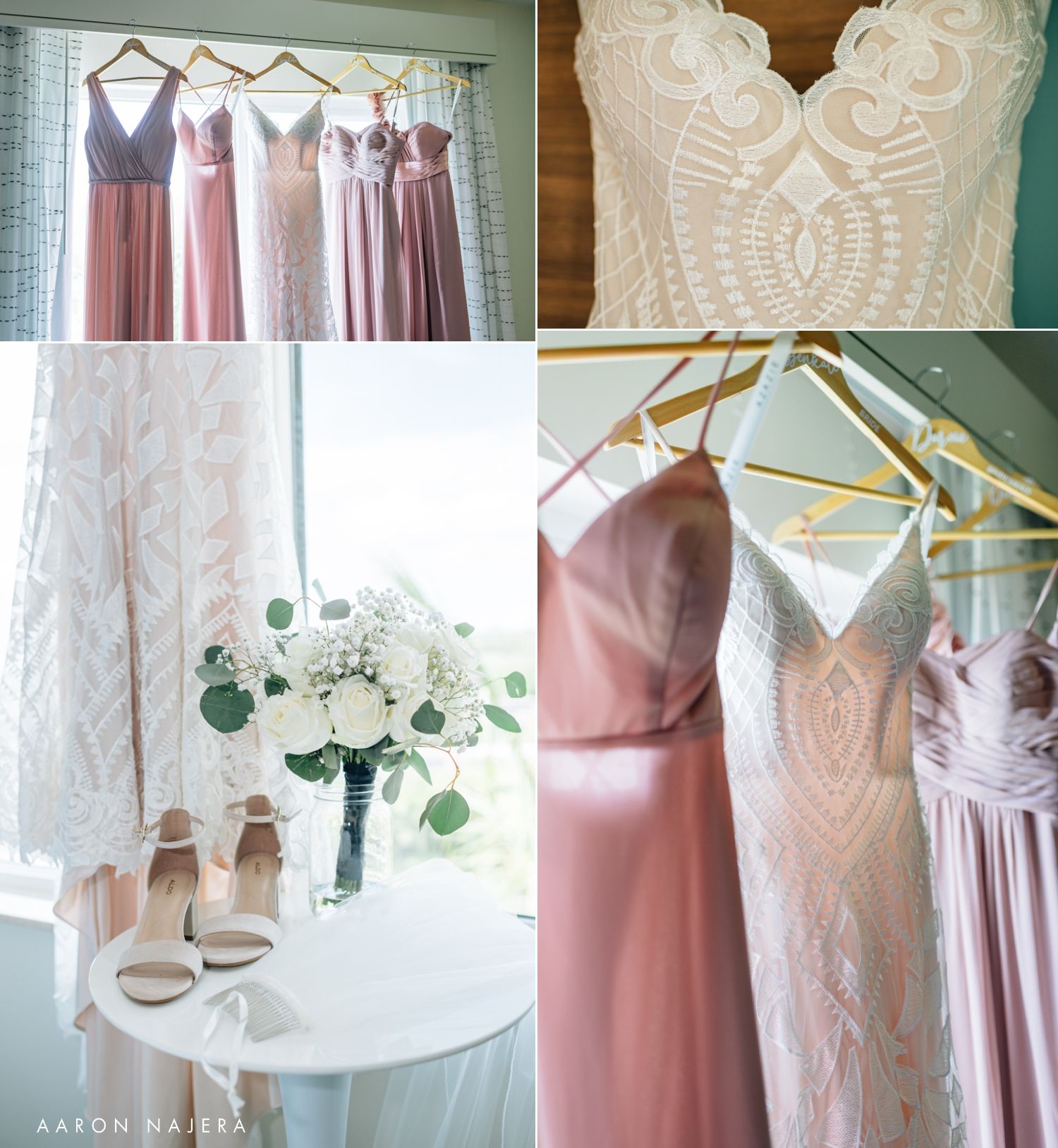 Wedding dresses and bridesmaid gowns in blush pink tones hang beside a white bouquet and bridal shoes.