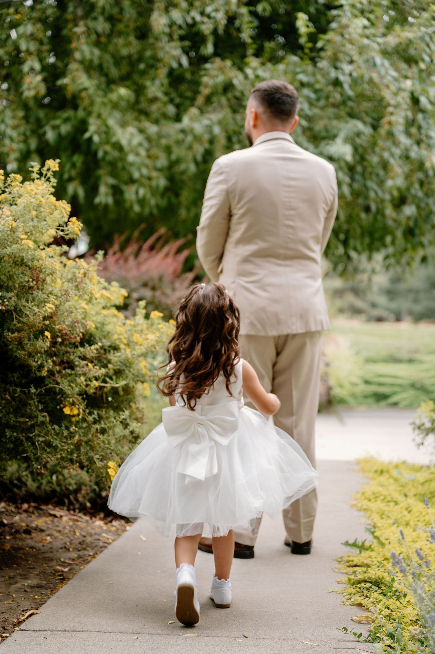 Groom and daughter first look