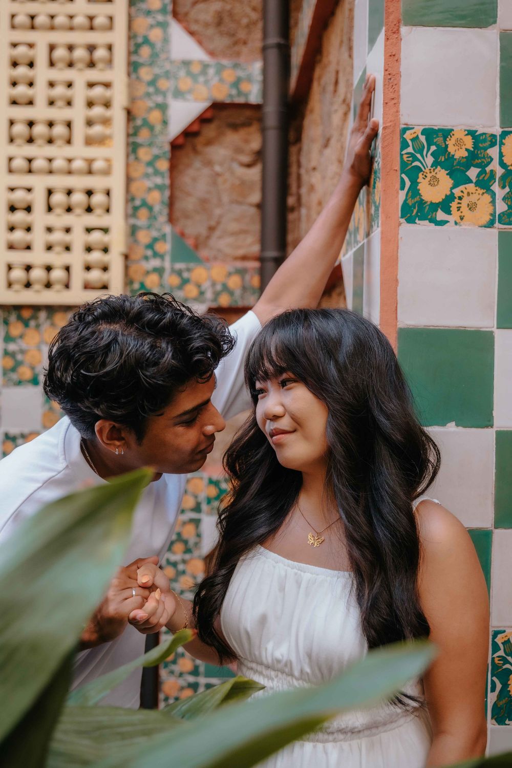 Sweet and tender hug between husband and wife during vacation shoot.