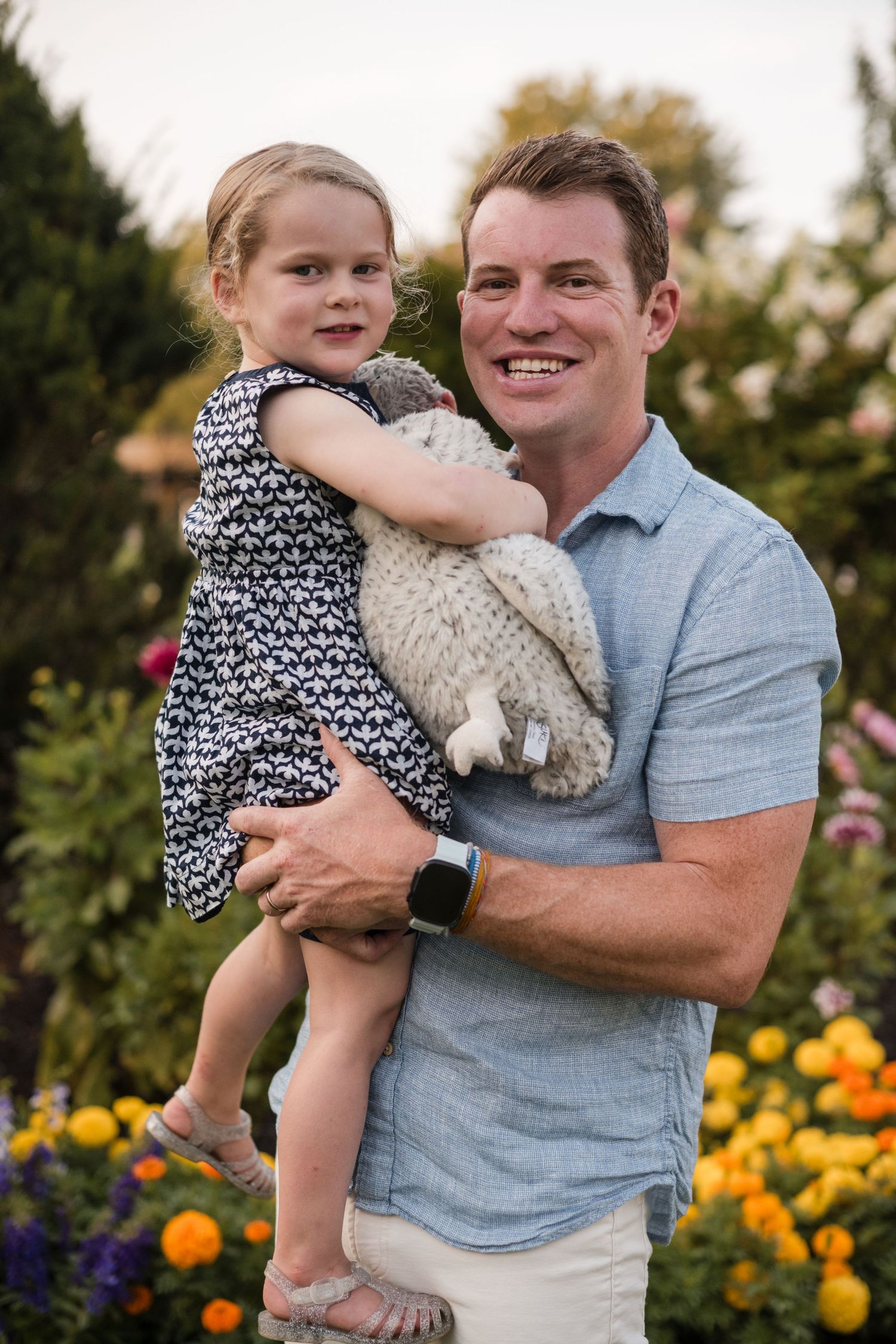 A series of candid outdoor photos in a garden with orange marigolds and purple flowers blooming in the background.