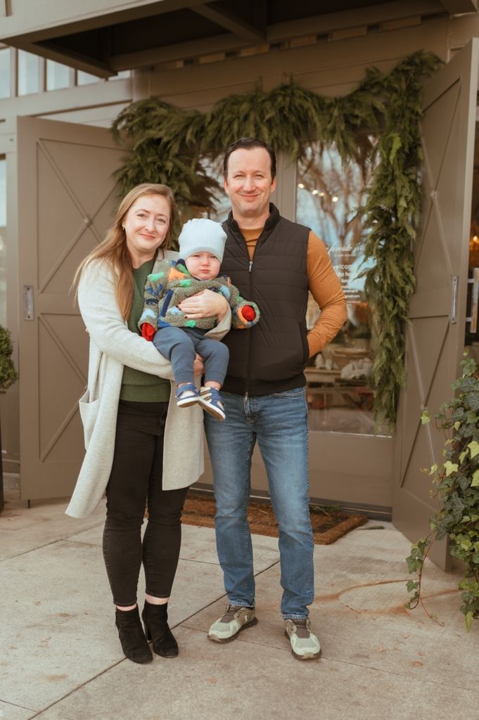 Three connected photos show a family standing together on a porch with holiday greenery decorations in the background.
