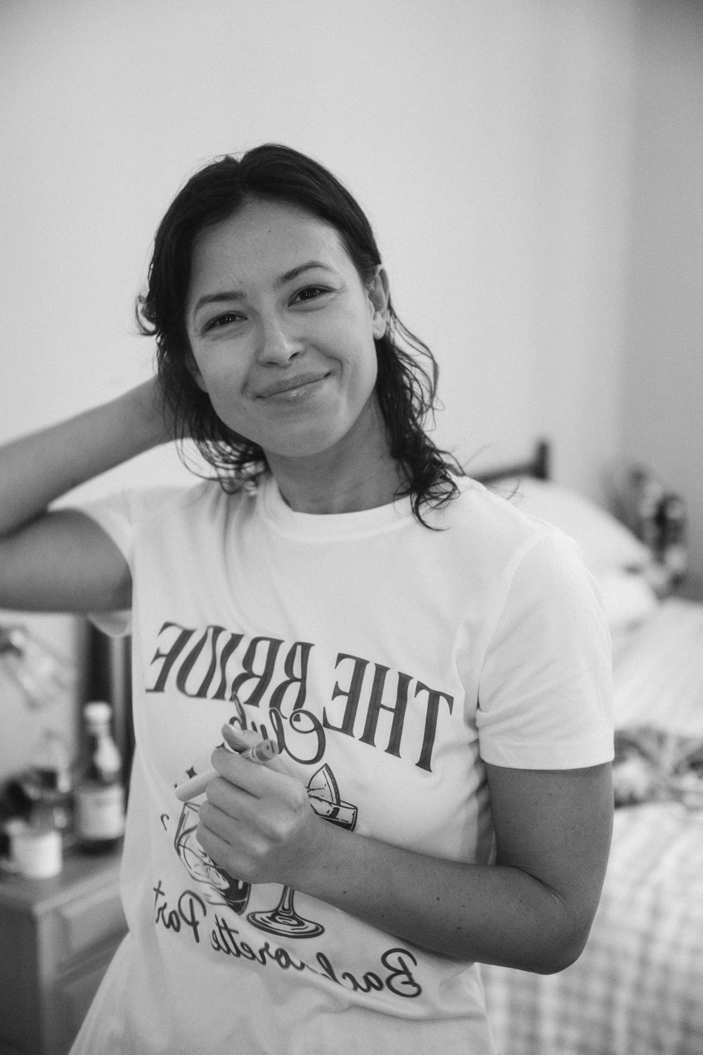 Casual getting ready moments captured in black and white photography.