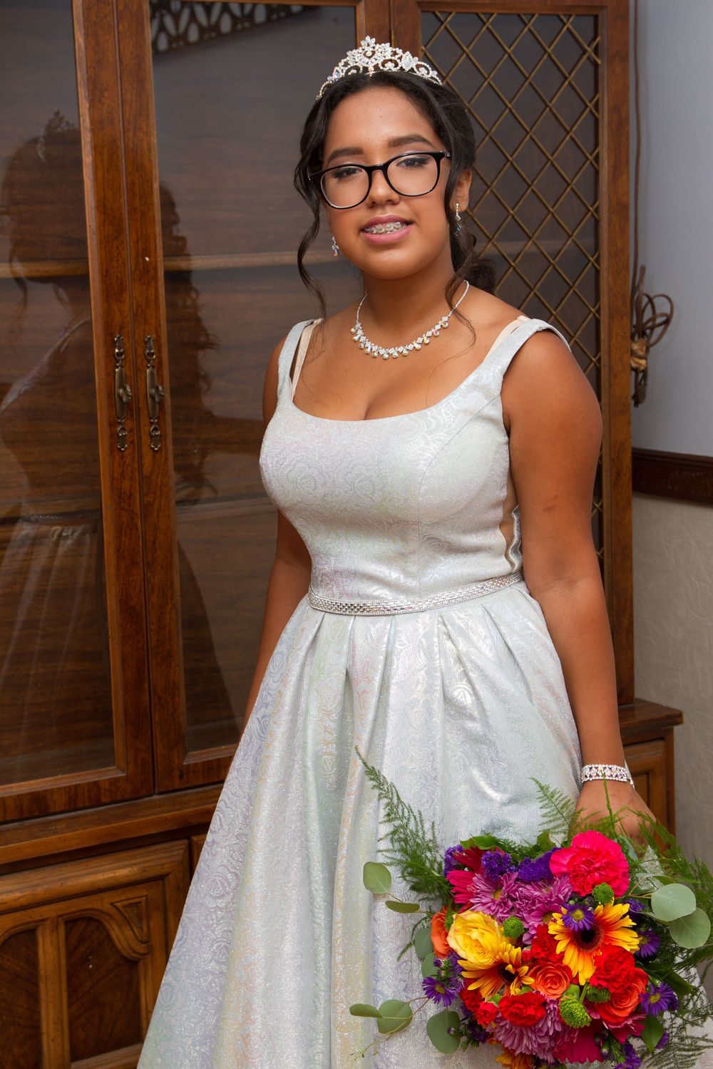 A professional shot of a young lady at her Quincerea.