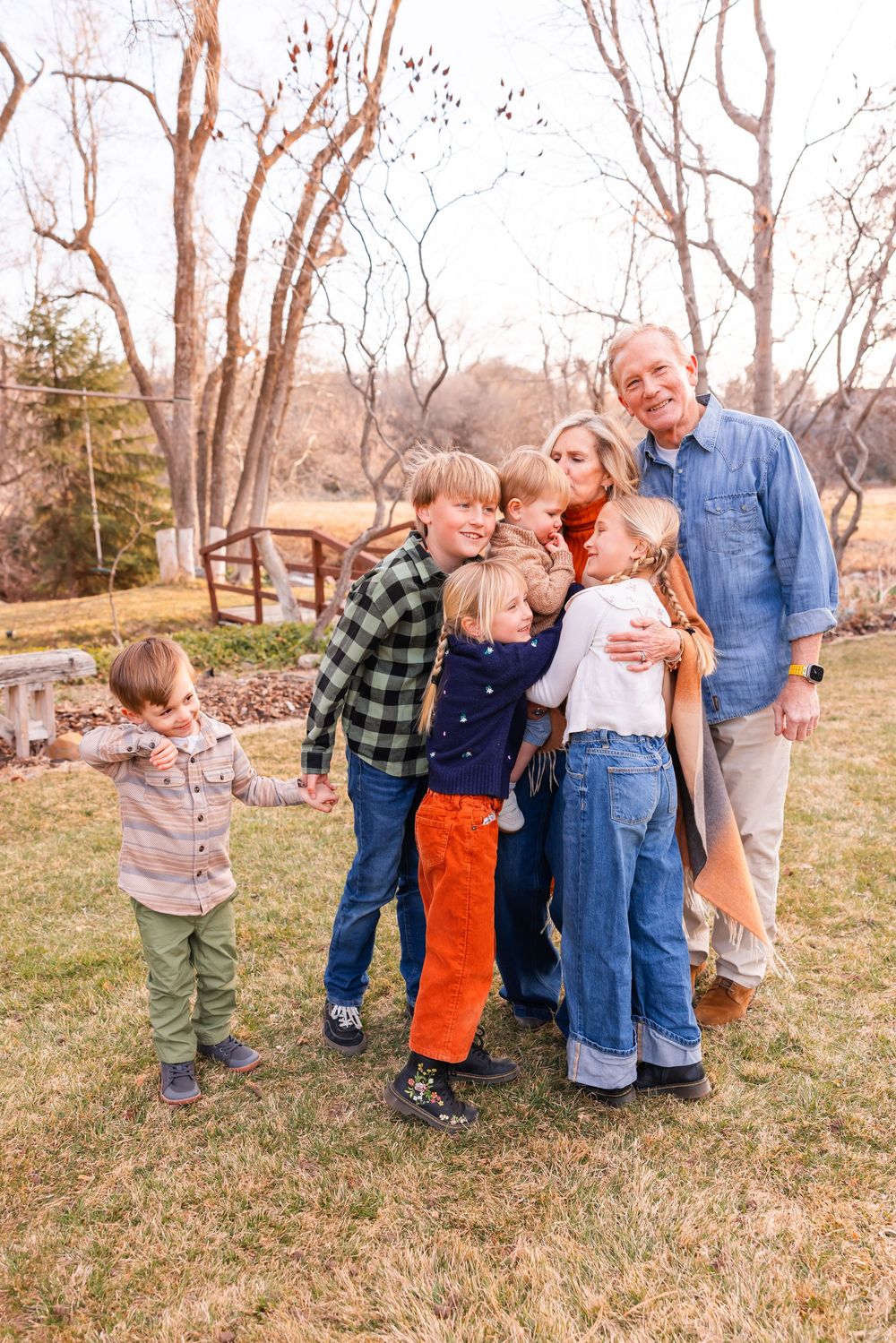 salt lake city utah family photographer, relaxed photo of extended family with grandparents snuggling grandkids