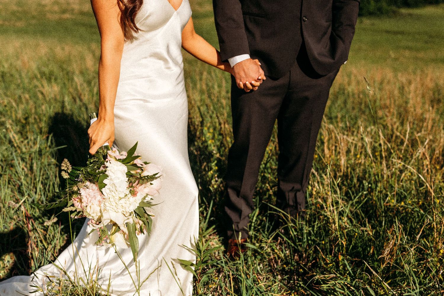 Connecticut Elopement couple holds hands and shows off their rings