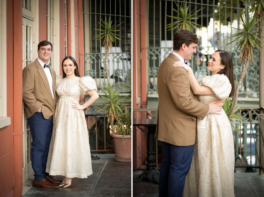 Romantic engagement photos taken along a historic building exterior with pink walls.
