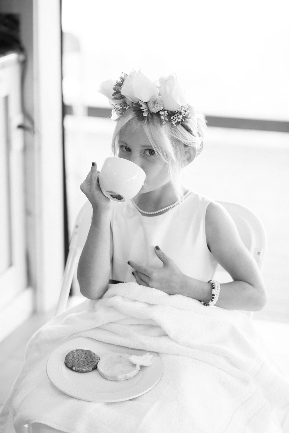 Flower girl drinking tea