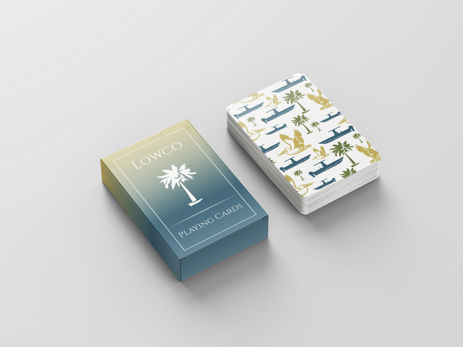 Two decks of tropical themed playing cards with palm tree designs in blue and gold.