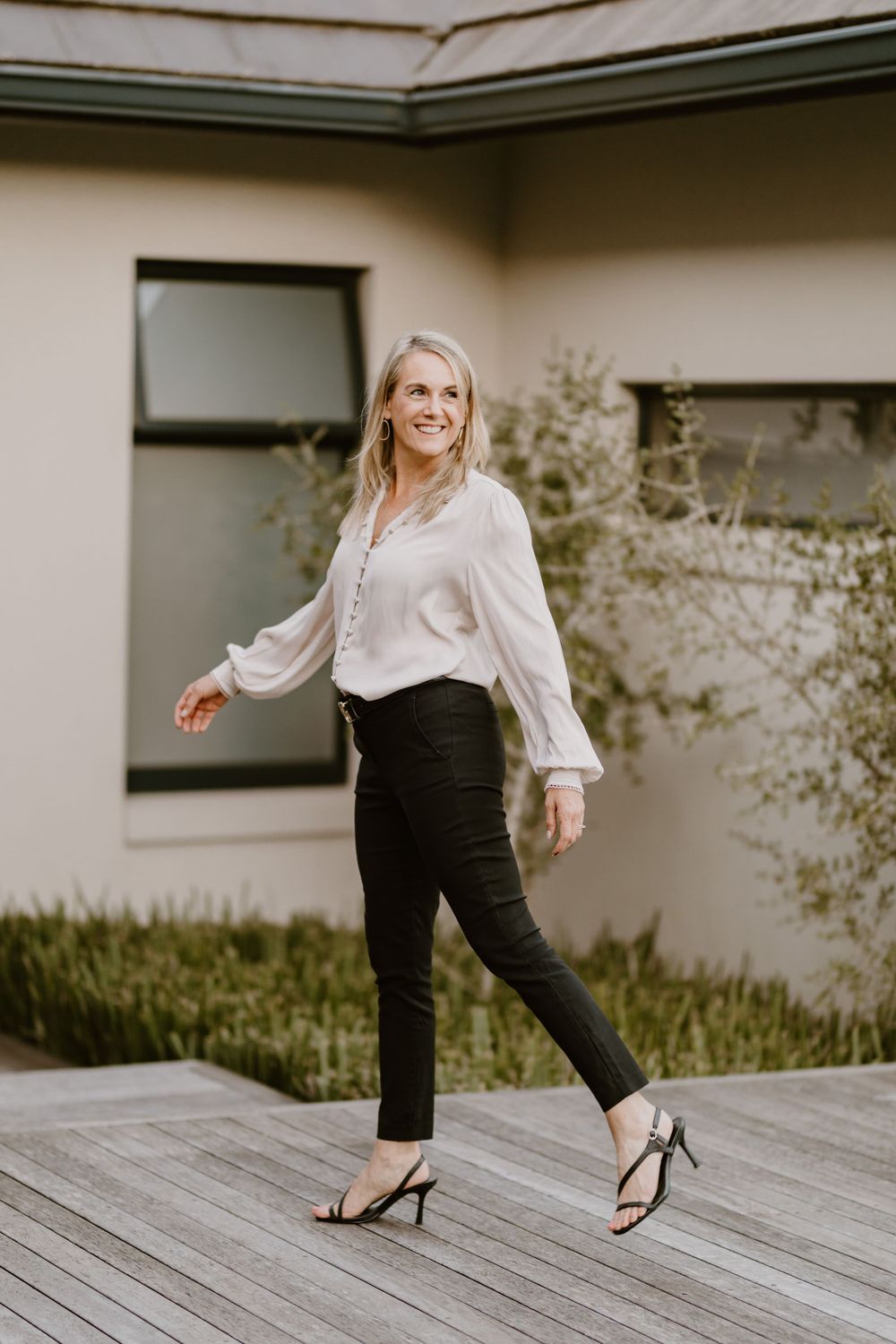 lady walking on wooden floor