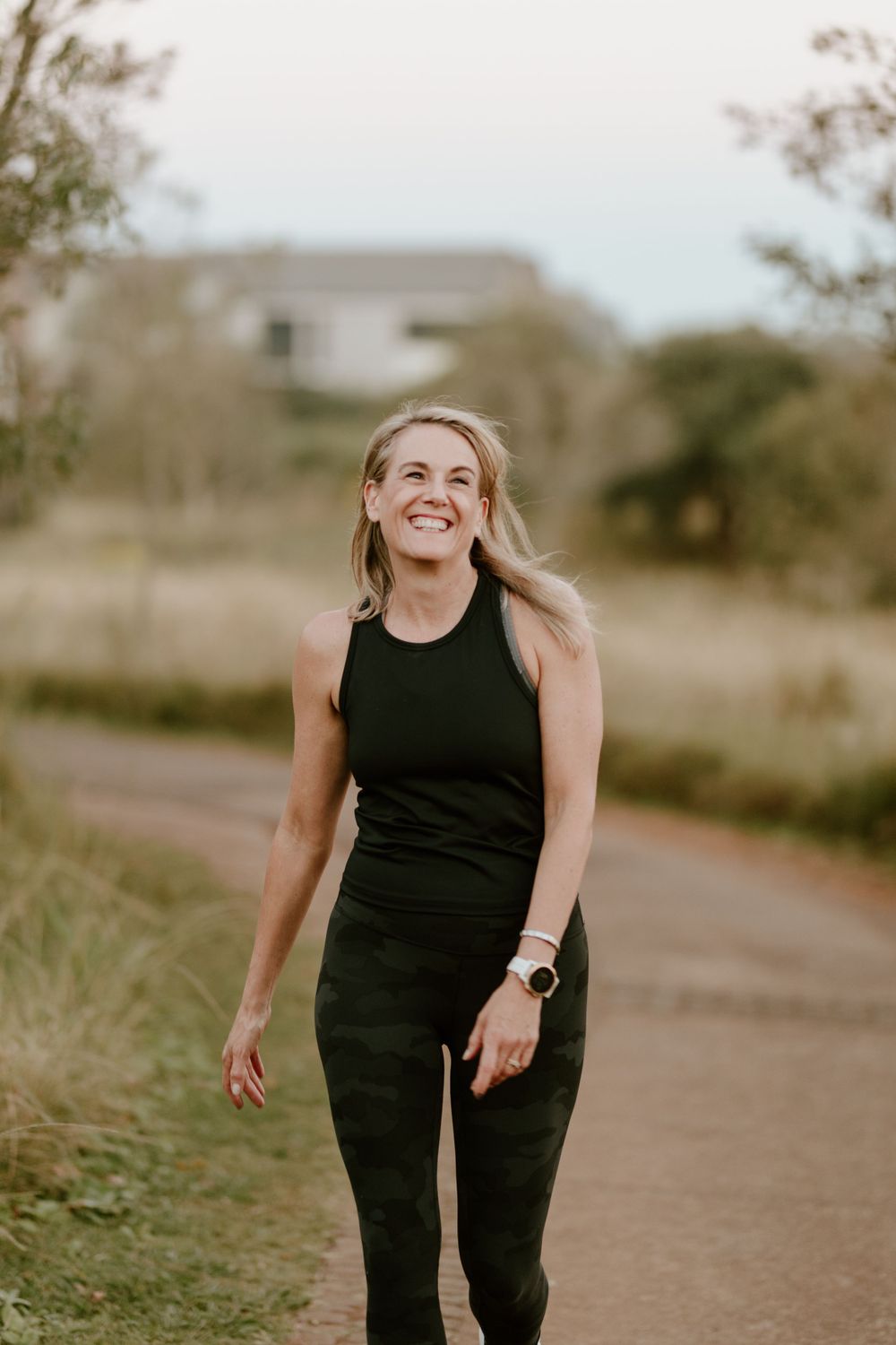 wellness influencer walking on path
