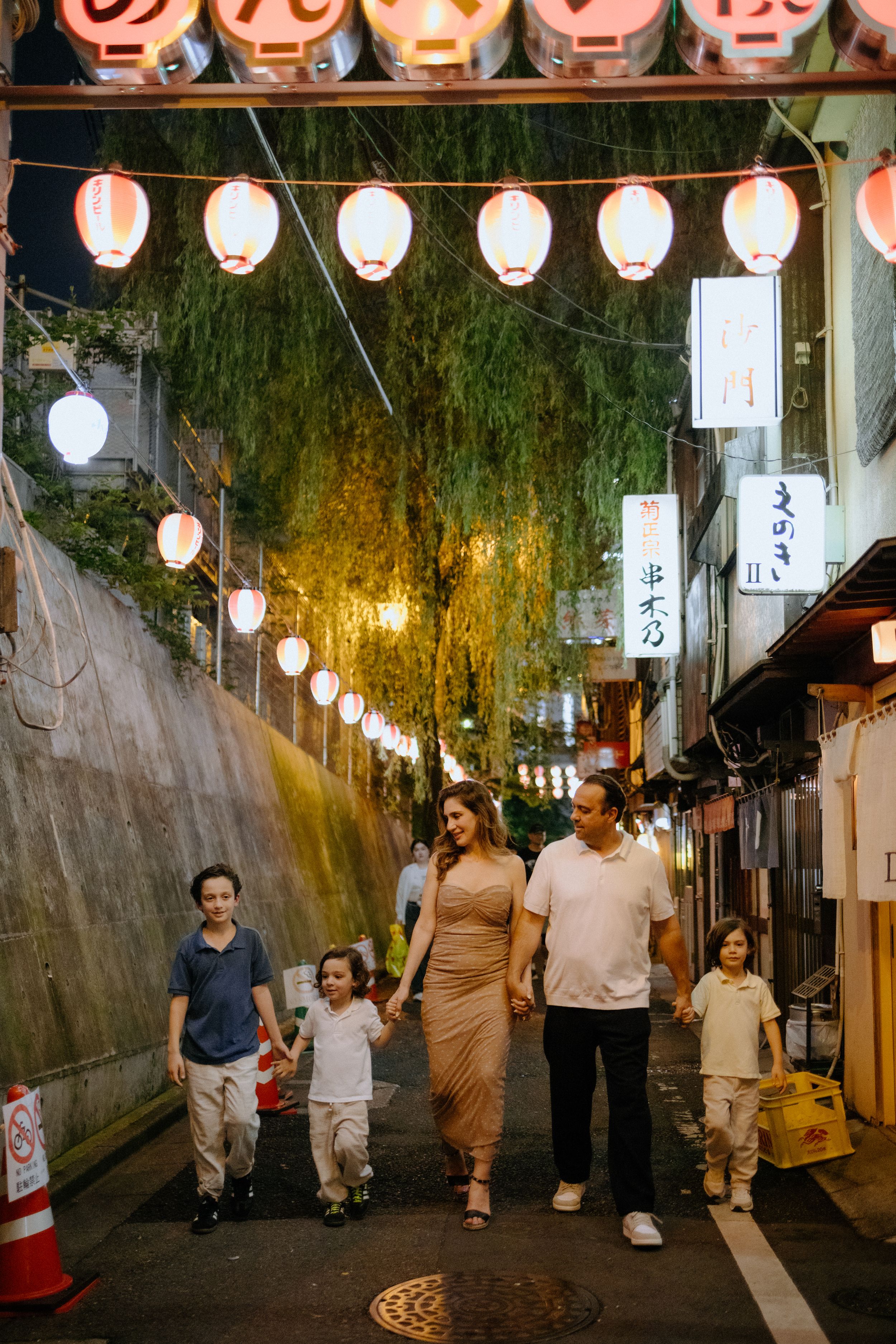 Tokyo nighttime street portrait of family