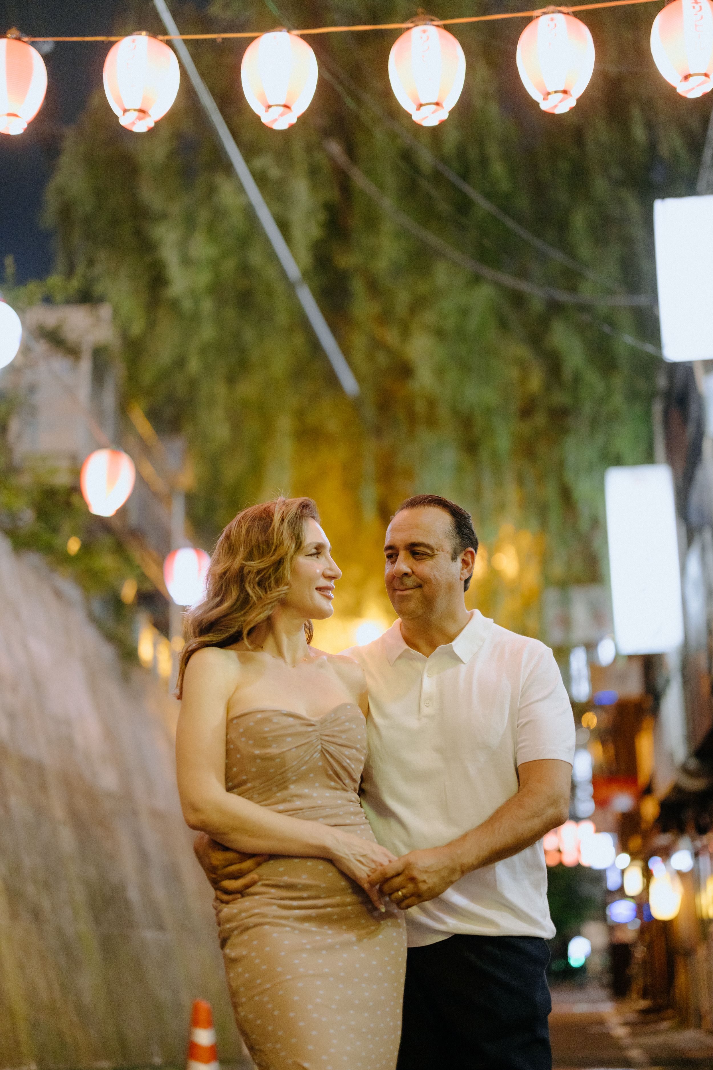 Tokyo nighttime street portrait of couple
