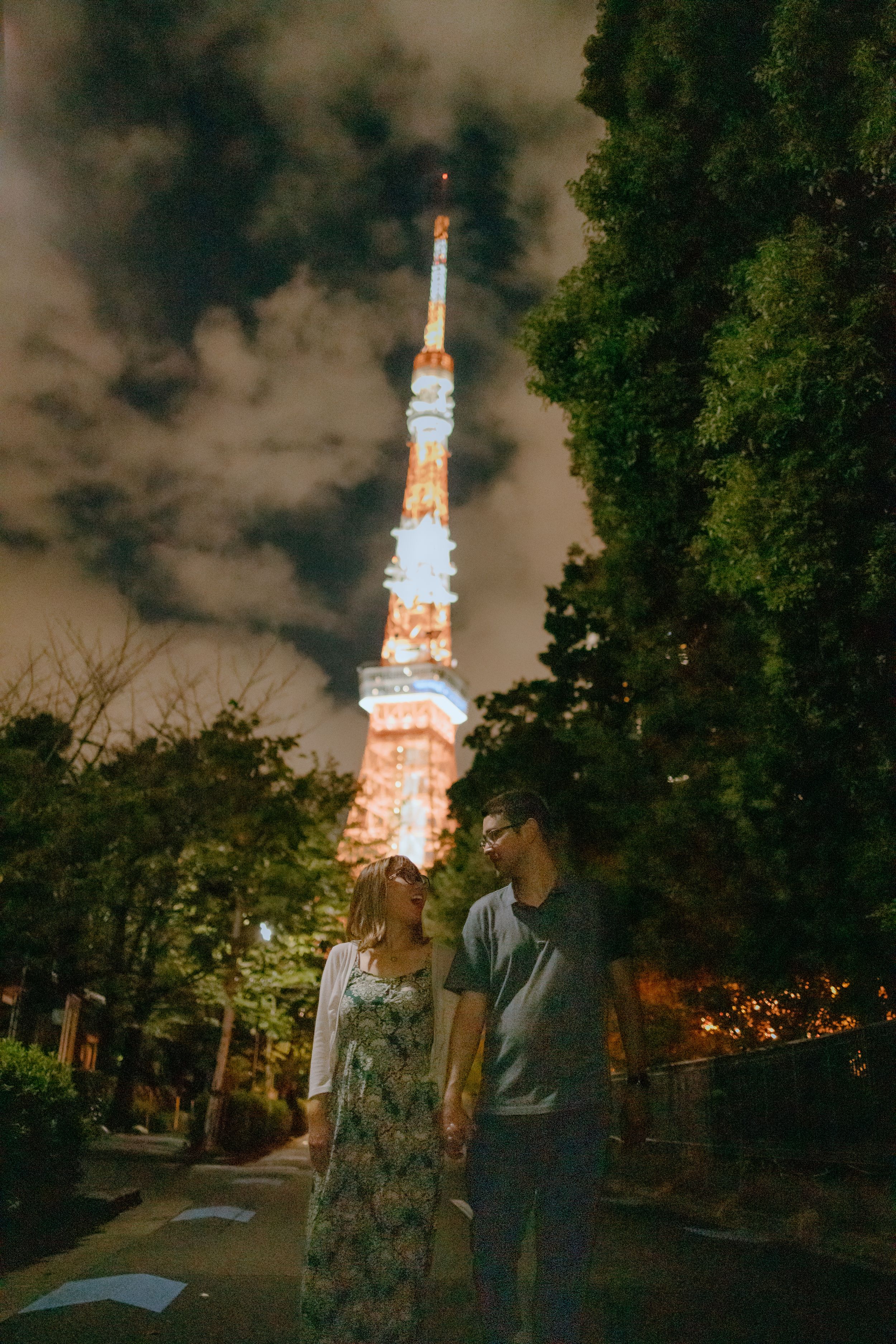 Tokyo nighttime street portrait of couple