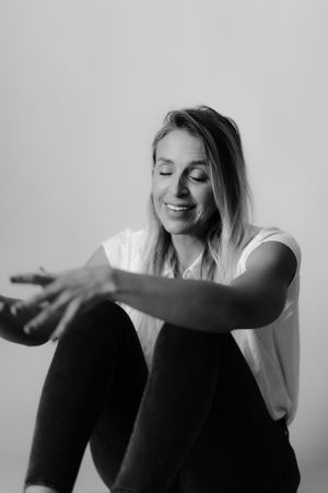 Candid portrait capturing a moment of genuine joy and relaxation.