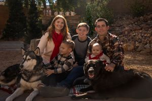 Family photos showing people sitting together outdoors in autumn settings with pets and children.