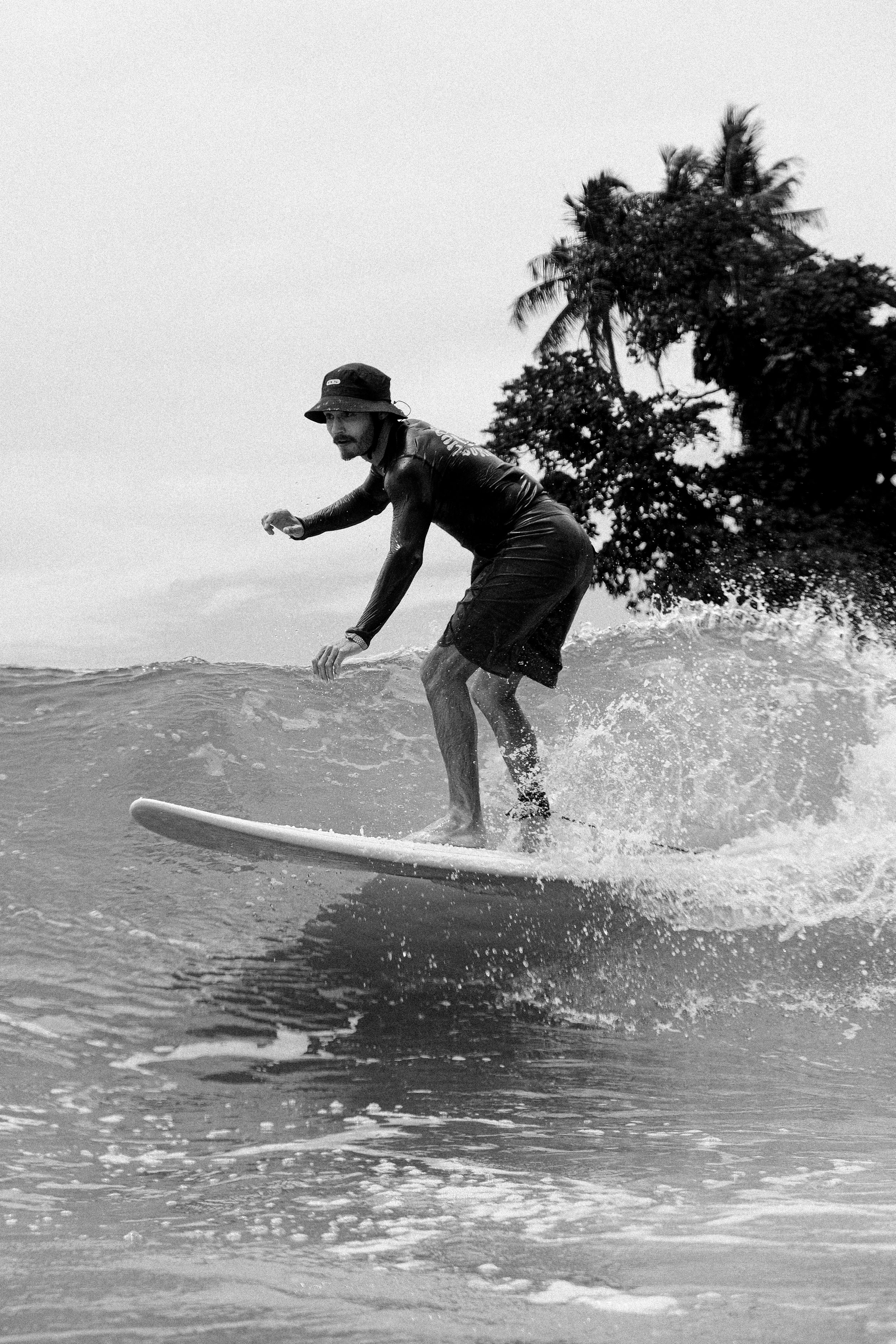 surfer up close on the board in water photo