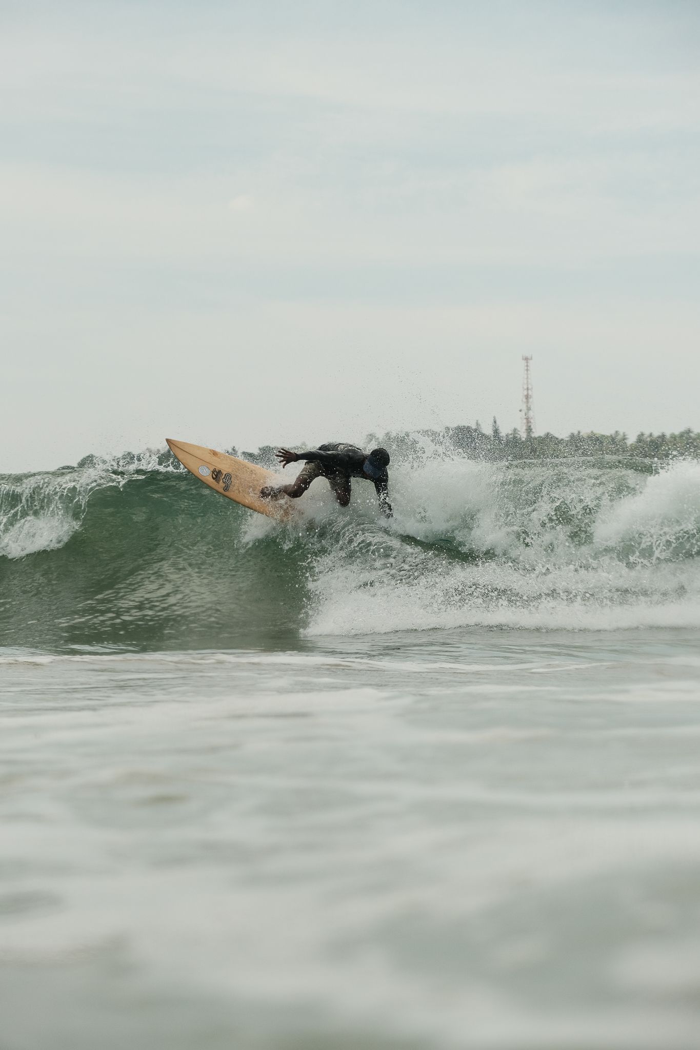 Sri Lanka guy turning on shortboard waves in water surf photo