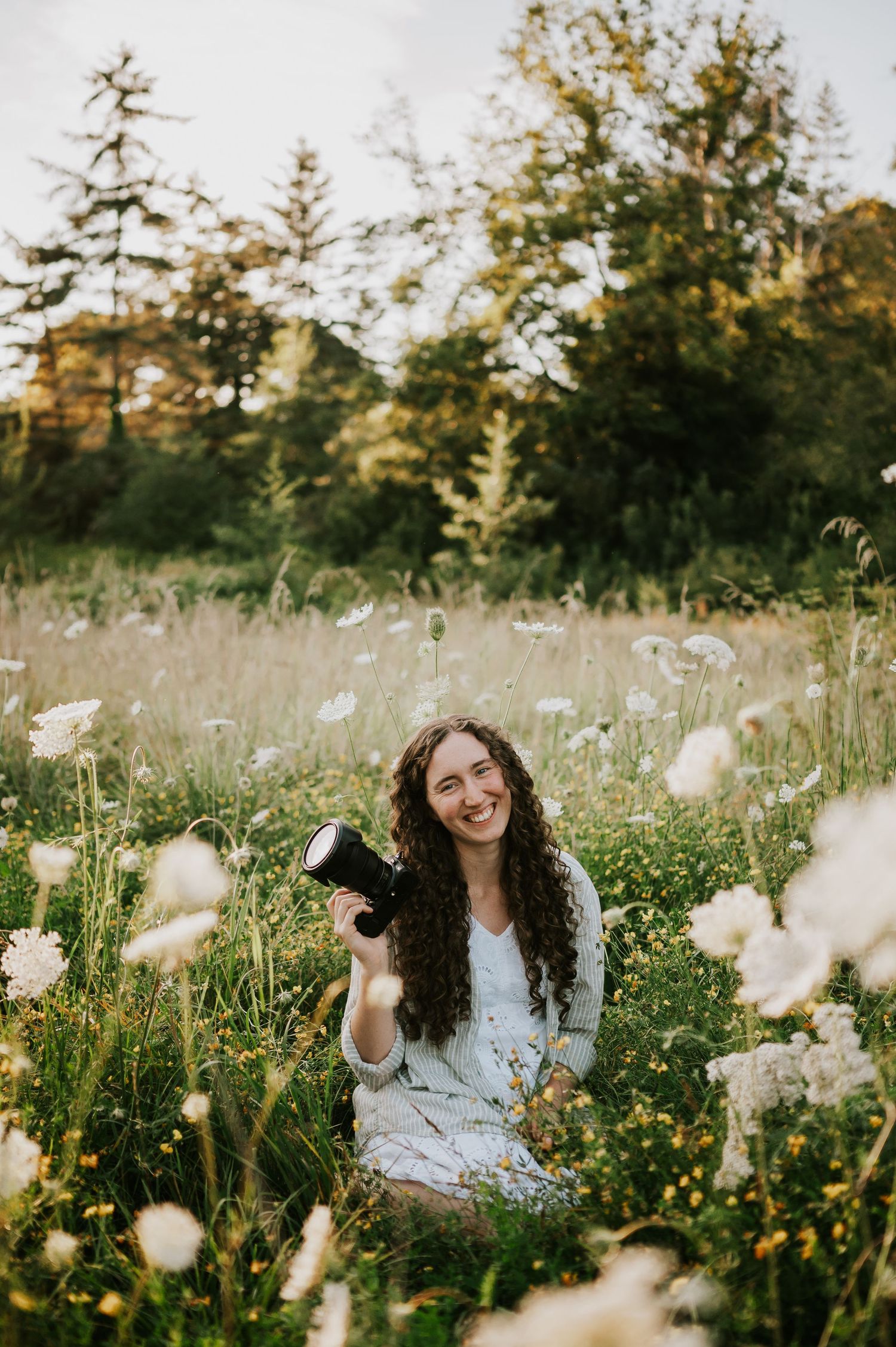 White wildflower field of photographer Self Portrait Photo Session in the Comox Valley. Photography by Photographer "Soulfull Photographs"