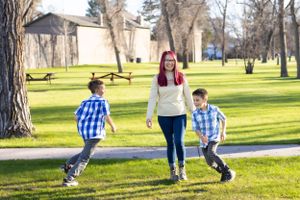 Mom and sons family photography family photoshoot playing in park photoshoot Fort Benton Montana Chouteau County portrait photography